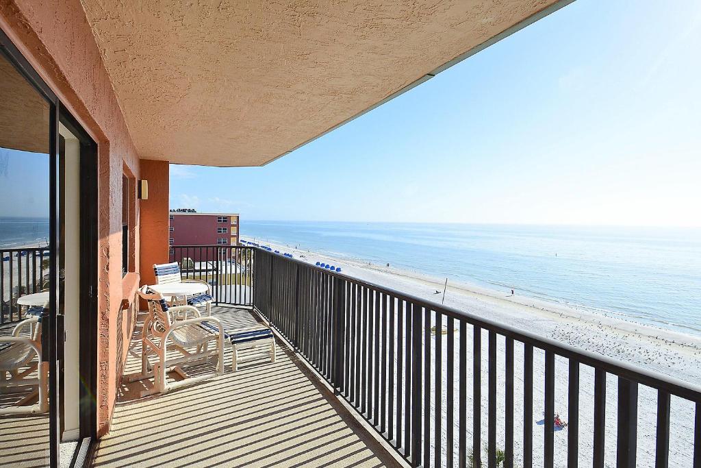 a balcony with a view of the beach at Emerald Isle 602 in St Pete Beach