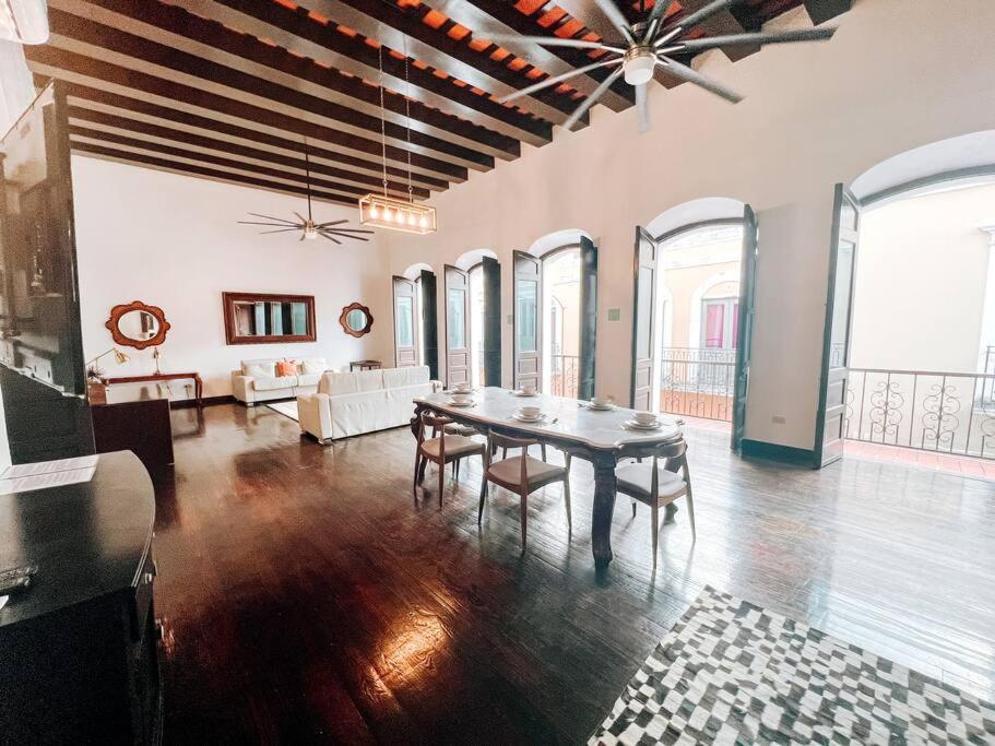 a large living room with a table and a couch at Tanca 255 Spacious Colonial House @ Old San Juan in San Juan