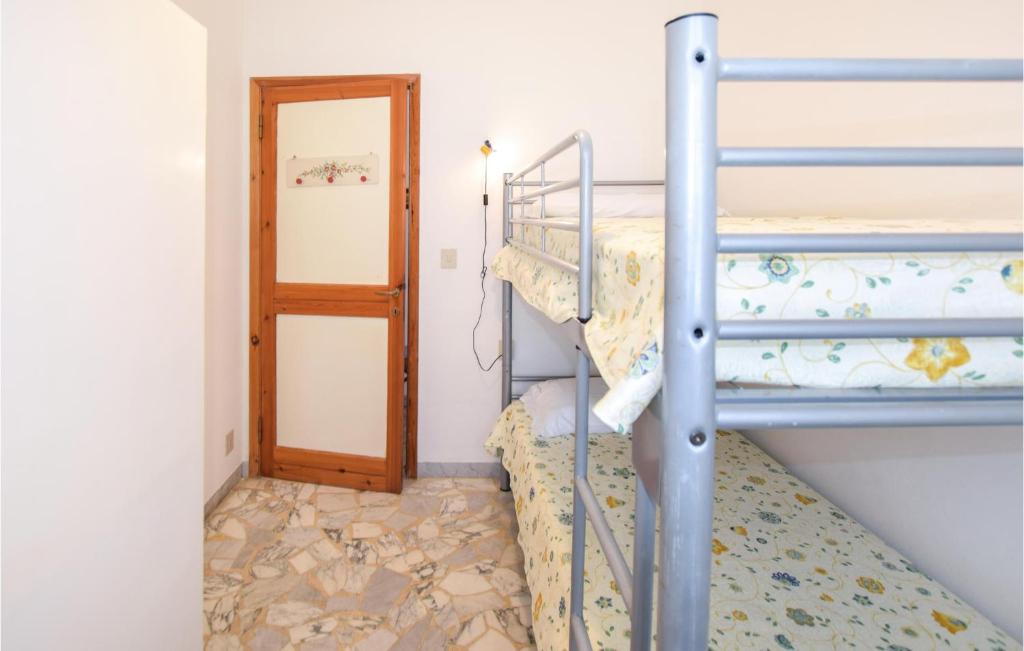 Posteľ alebo postele v izbe v ubytovaní Stunning Apartment In Lido Di Camaiore