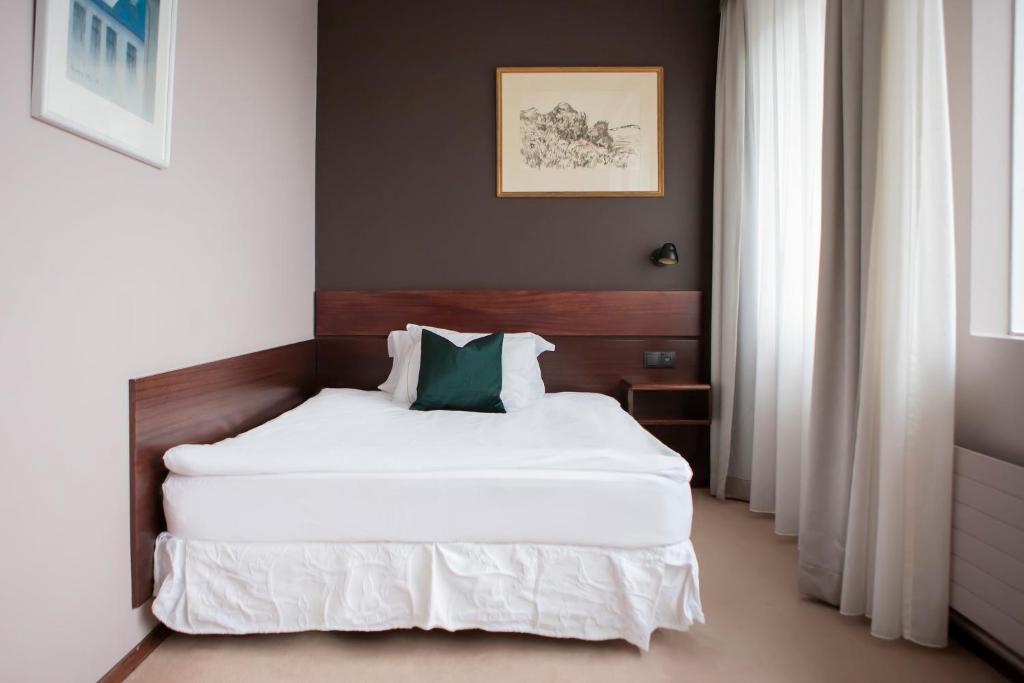 Llit o llits en una habitació de Hotel Holt - The Art Hotel