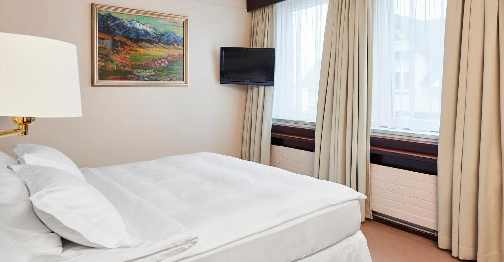 Llit o llits en una habitació de Hotel Holt - The Art Hotel