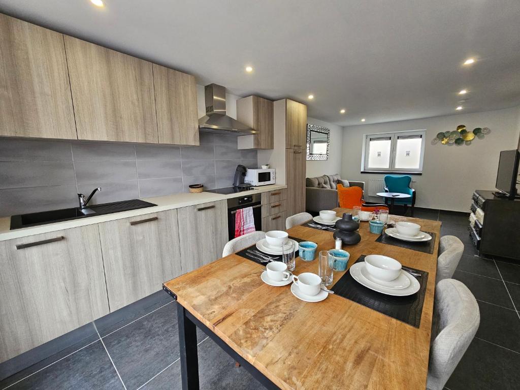 Eldhús eða eldhúskrókur á Appart'Hôtel Trazegnies