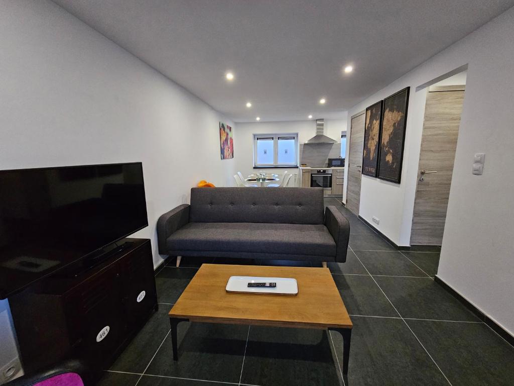 Eldhús eða eldhúskrókur á Appart'Hôtel Trazegnies