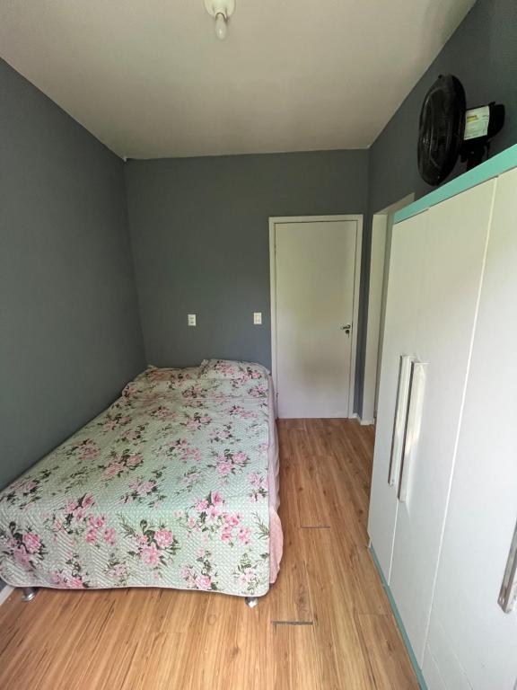 Giường trong phòng chung tại Quarto Suíte Hostel