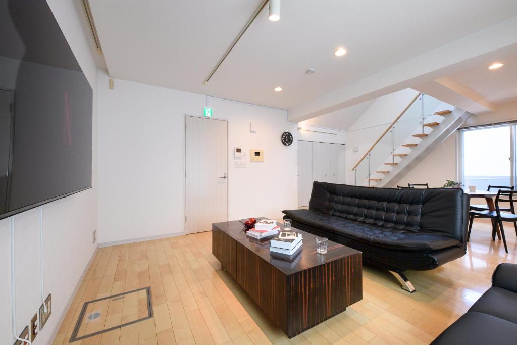 Posezení v ubytování Shibuya City House 渋谷シティハウス