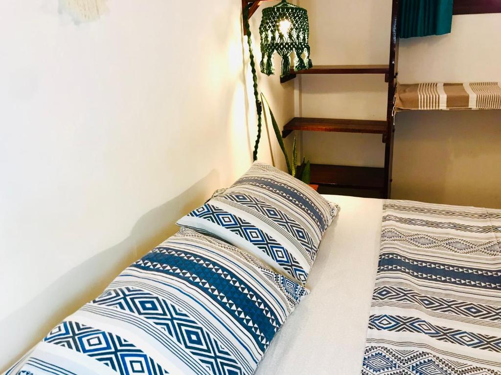 Postel nebo postele na pokoji v ubytování Residencial Bem-te-vi