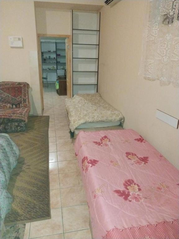 Postel nebo postele na pokoji v ubytování Apart-otel'"Tsarskoe-selo"