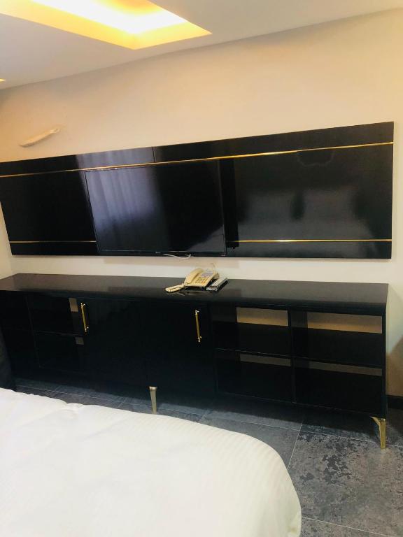 Postel nebo postele na pokoji v ubytování KY Continental Apartments