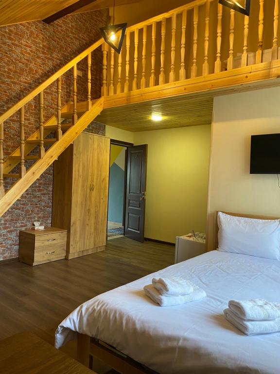 Postel nebo postele na pokoji v ubytování NOY Guest House B&B