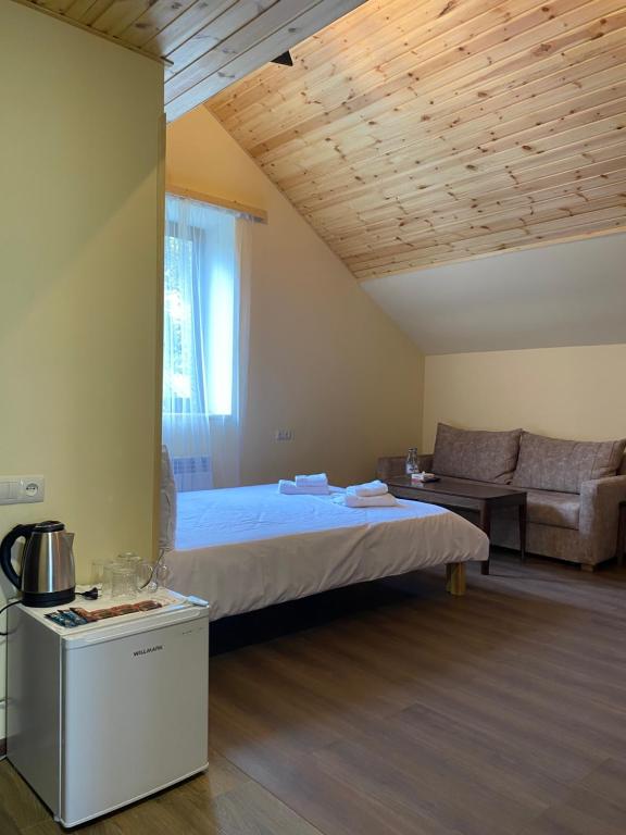Postel nebo postele na pokoji v ubytování NOY Guest House B&B