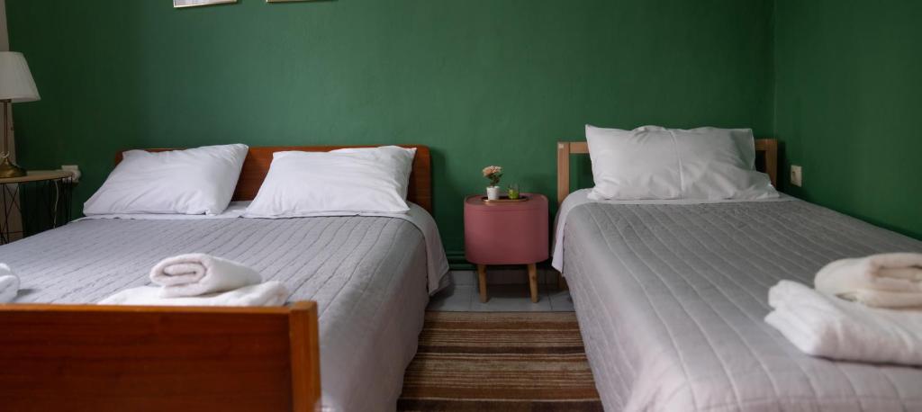 A bed or beds in a room at Casa de Pozar