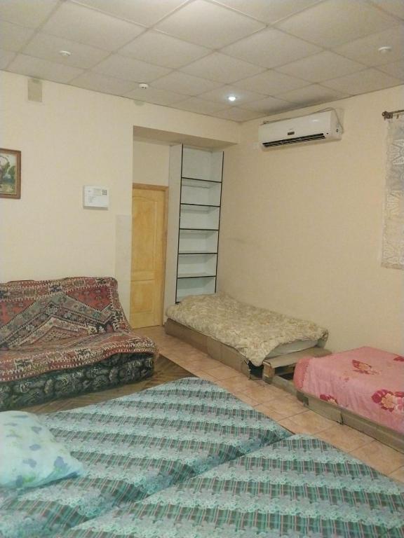 Postel nebo postele na pokoji v ubytování Apart-otel'"Tsarskoe-selo"