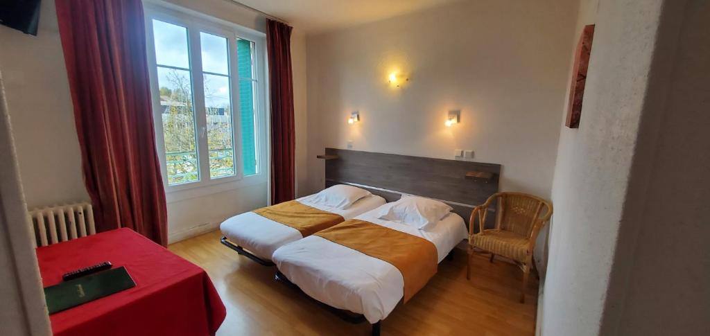 Postel nebo postele na pokoji v ubytování Hotel Bar Restaurant Saint Paul