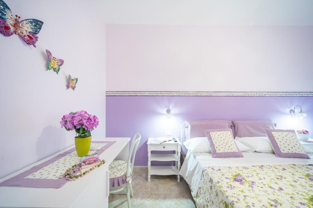 Postel nebo postele na pokoji v ubytování Almaré B&B