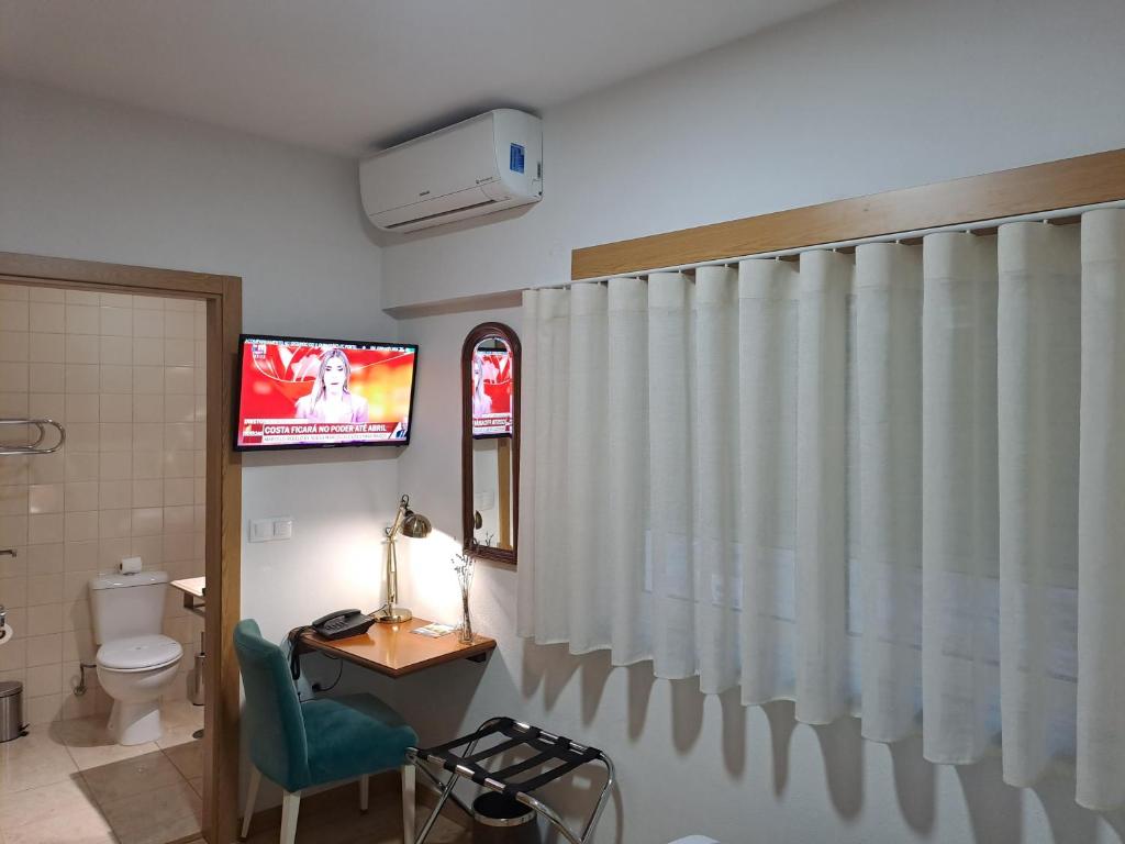 Ein Badezimmer in der Unterkunft Hotel SQUARE