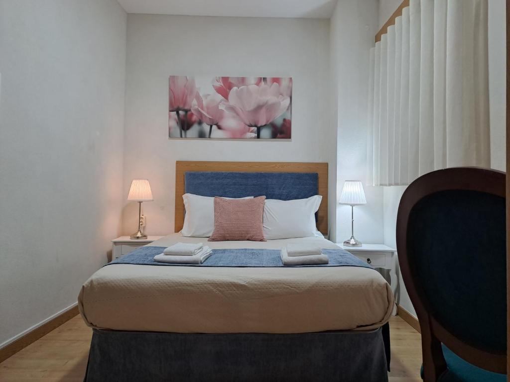 Ein Bett oder Betten in einem Zimmer der Unterkunft Hotel SQUARE