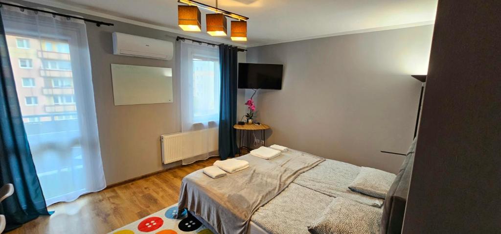 Ένα ή περισσότερα κρεβάτια σε δωμάτιο στο Miami Vice apartament by Karl