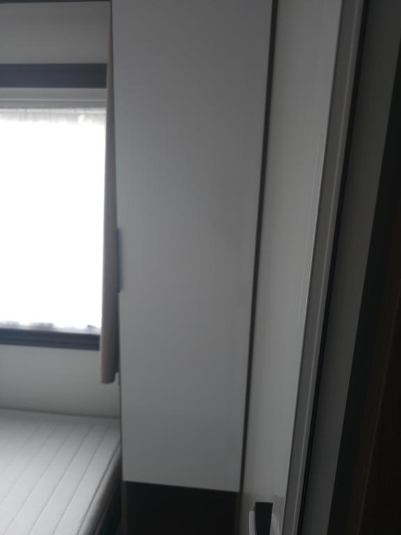 a room with a window and a window sill at Les sable du midi 3 in Valras-Plage