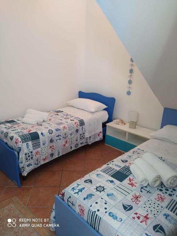 Casa Vacanze da Merlino a Gonnesa - Rifugio con terrazza
