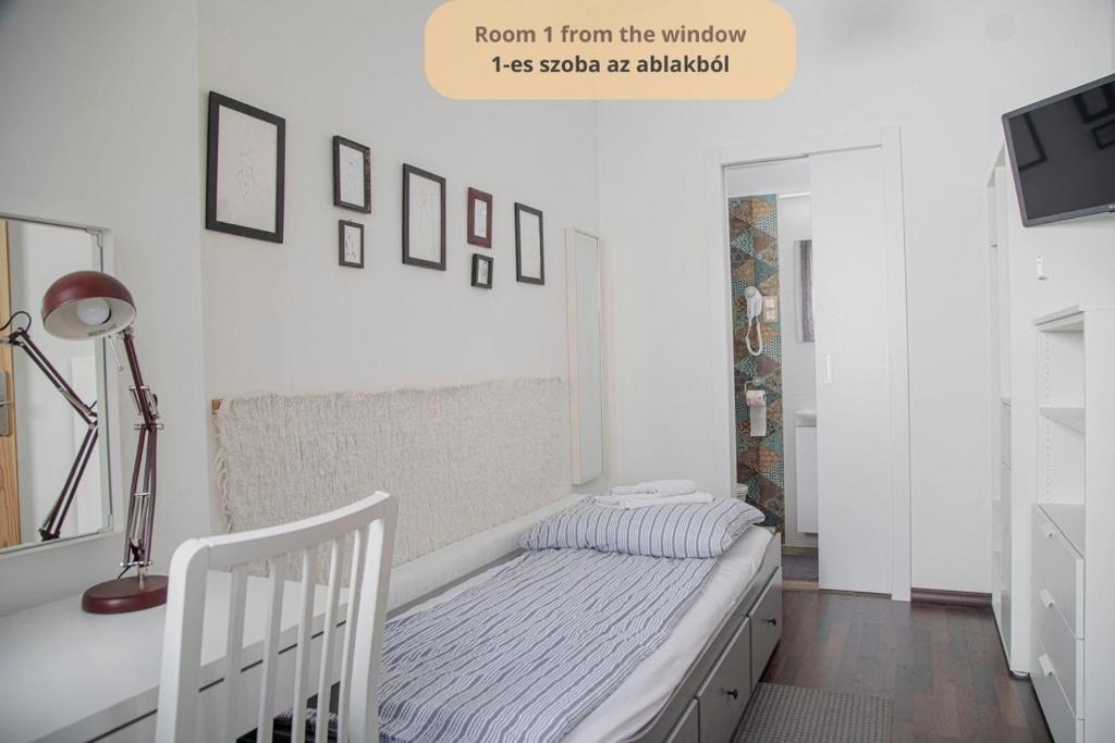 Postel nebo postele na pokoji v ubytování Tulip Home Guest House