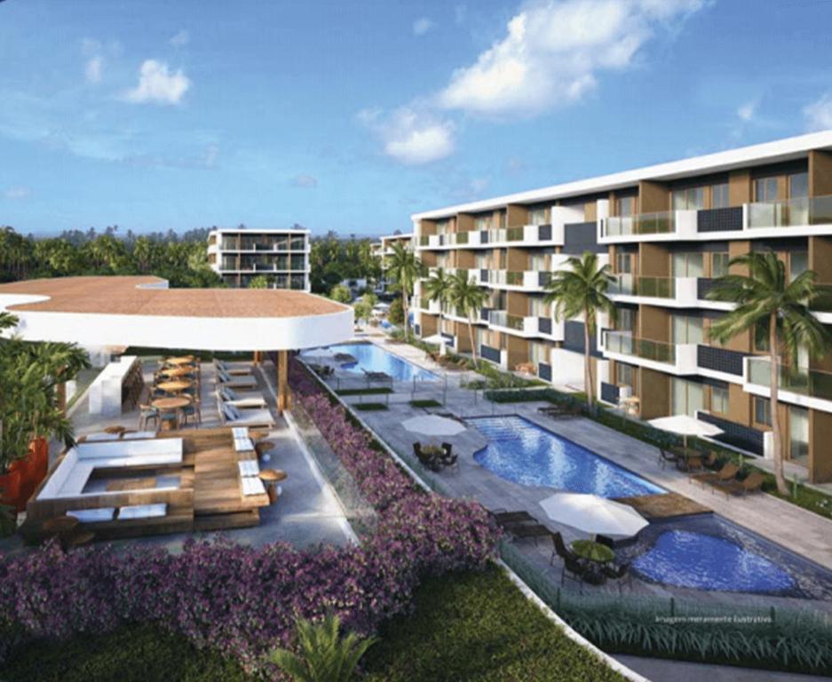 ポルト・デ・ガリーニャスにあるMakia Beach By BMSのスイミングプールとリゾートを併設するホテルです。