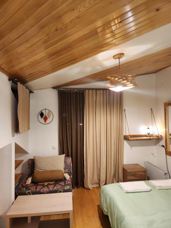 Postel nebo postele na pokoji v ubytování Sanli