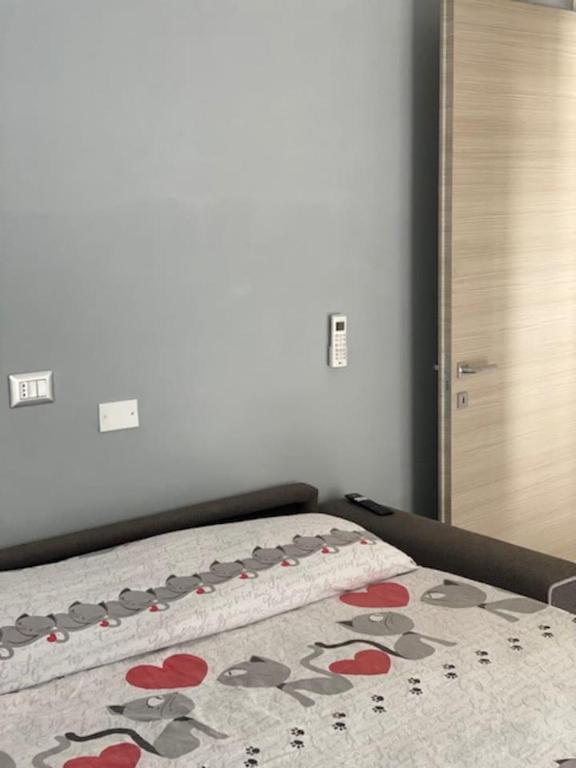 Postel nebo postele na pokoji v ubytování Lo scrigno dei nonni