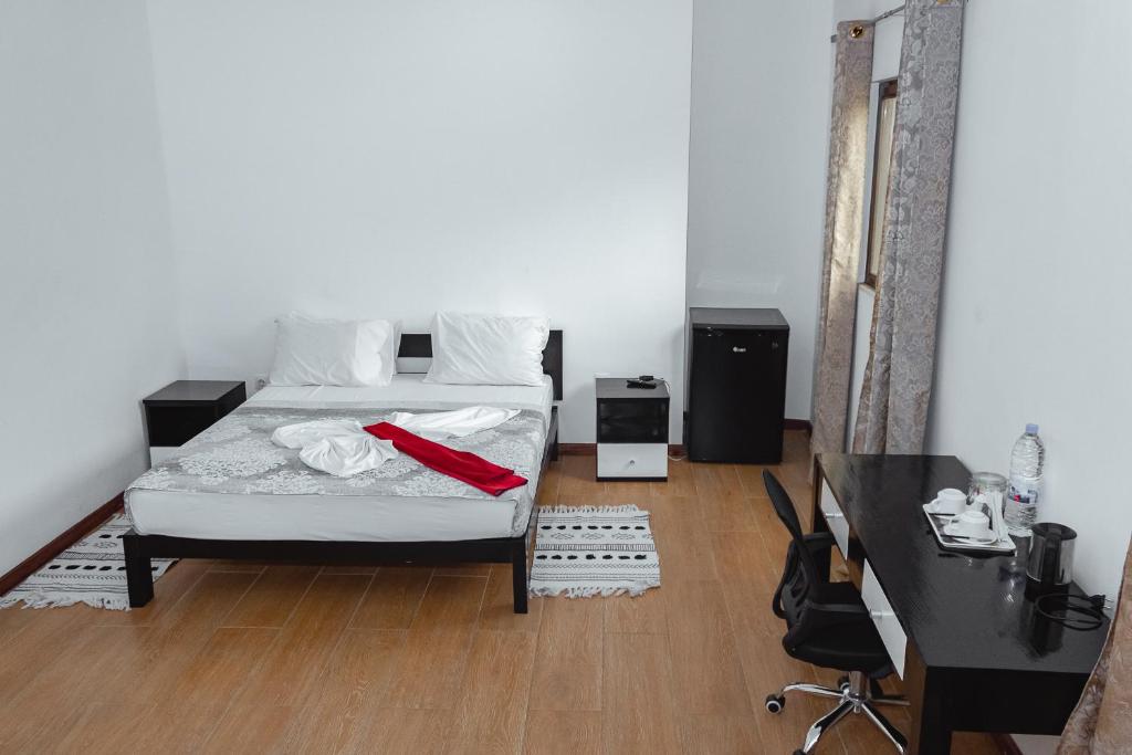 Baig's Guest Houseにあるベッド