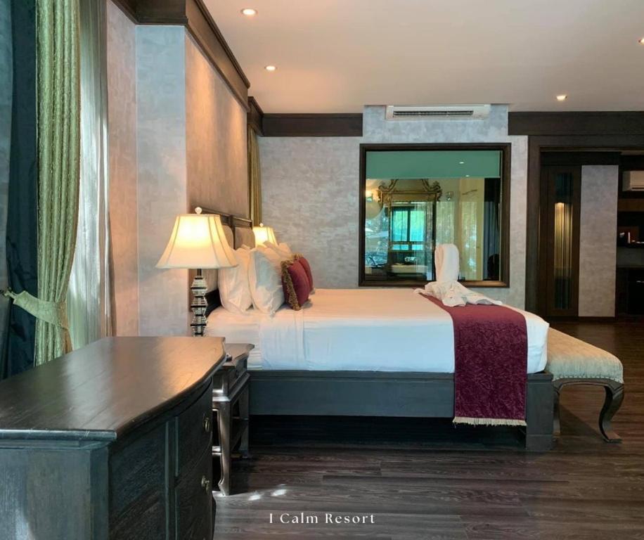 Postel nebo postele na pokoji v ubytování I Calm Resort Cha Am