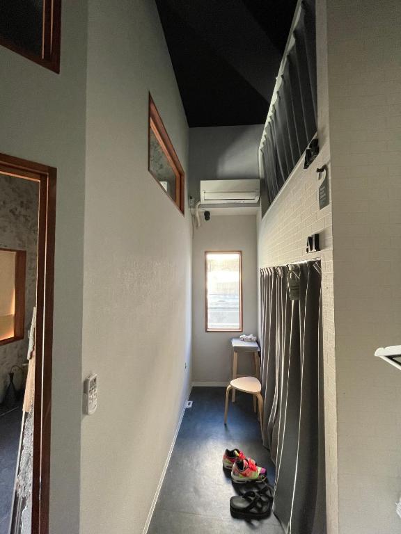 Postel nebo postele na pokoji v ubytování Hostel 1010 & MILLS COFFEE