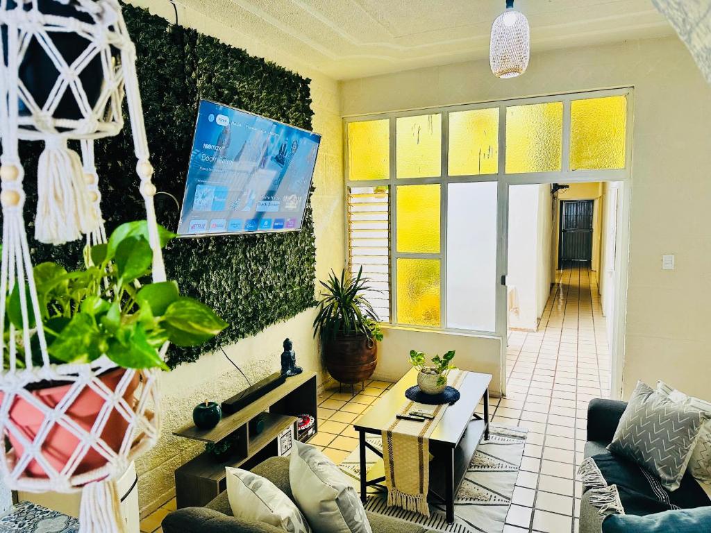 TV a/nebo společenská místnost v ubytování Casa Valentía
