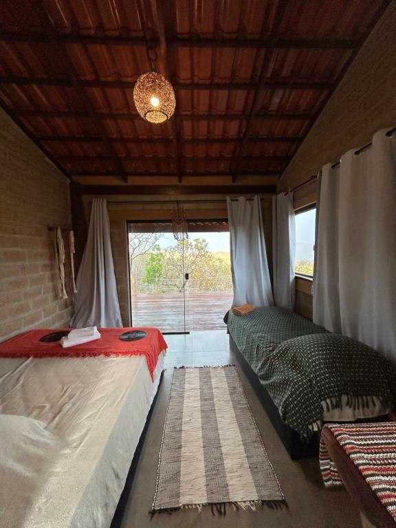 Postel nebo postele na pokoji v ubytování Chalé Pousada Maná do Céu - São Jorge