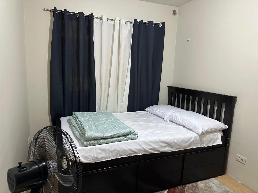 מיטה או מיטות בחדר ב-Sorrento Oasis 2 BR