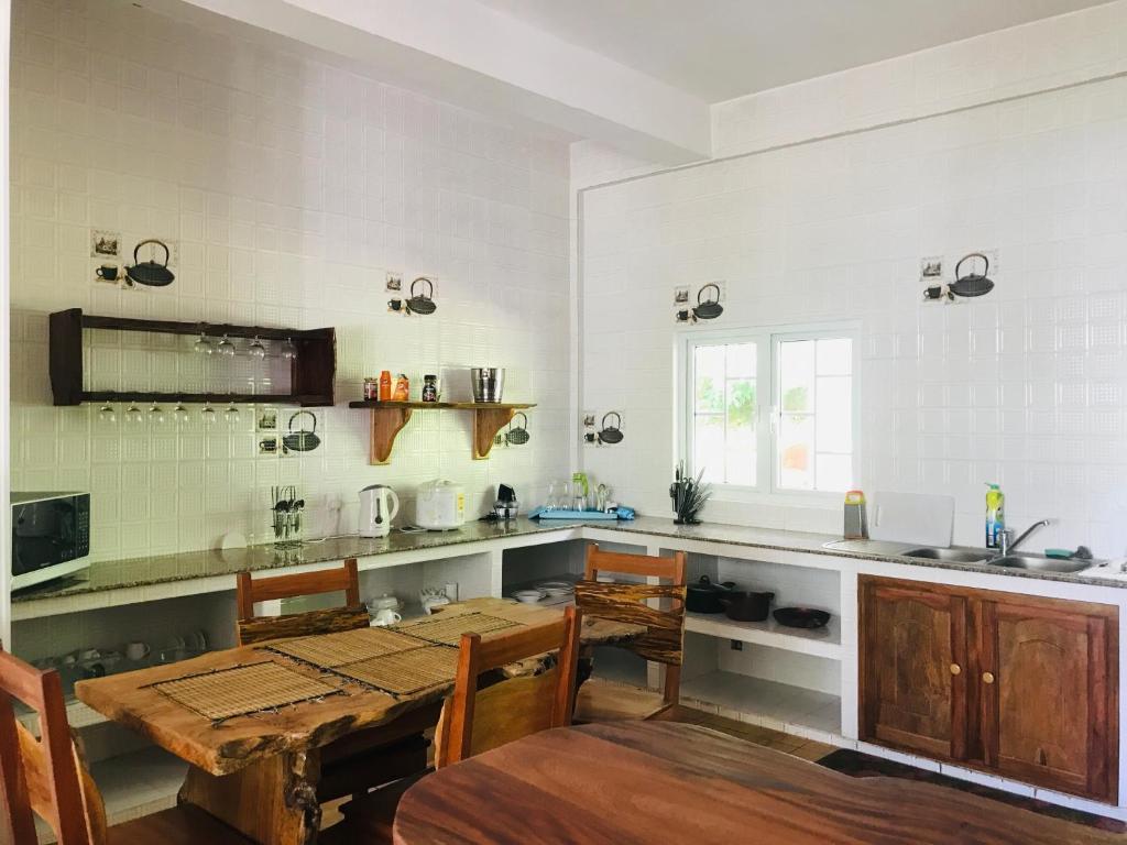 Kuchyň nebo kuchyňský kout v ubytování Villa Des Flots