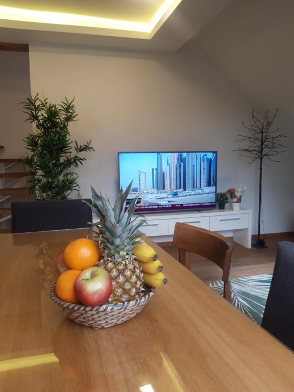TV i/ili multimedijalni sistem u objektu Top Rest - Vila Borova