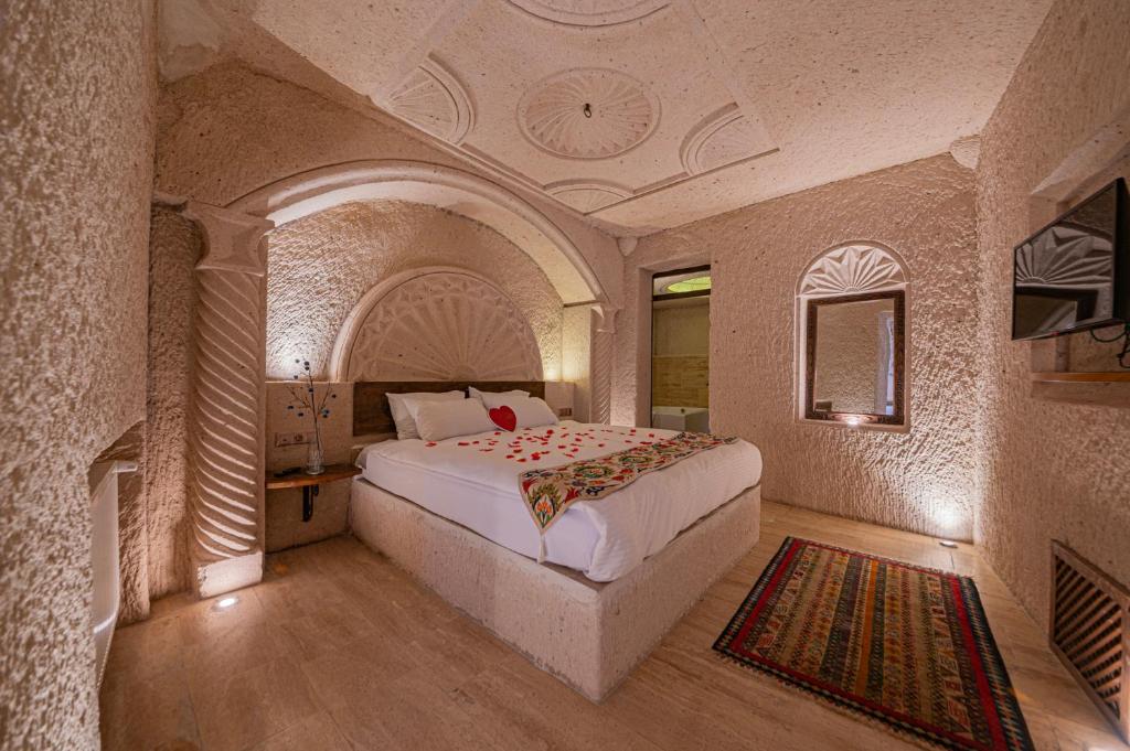 Postel nebo postele na pokoji v ubytování Corner İn Cappadocia
