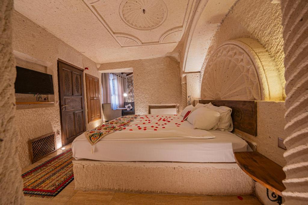 Postel nebo postele na pokoji v ubytování Corner İn Cappadocia