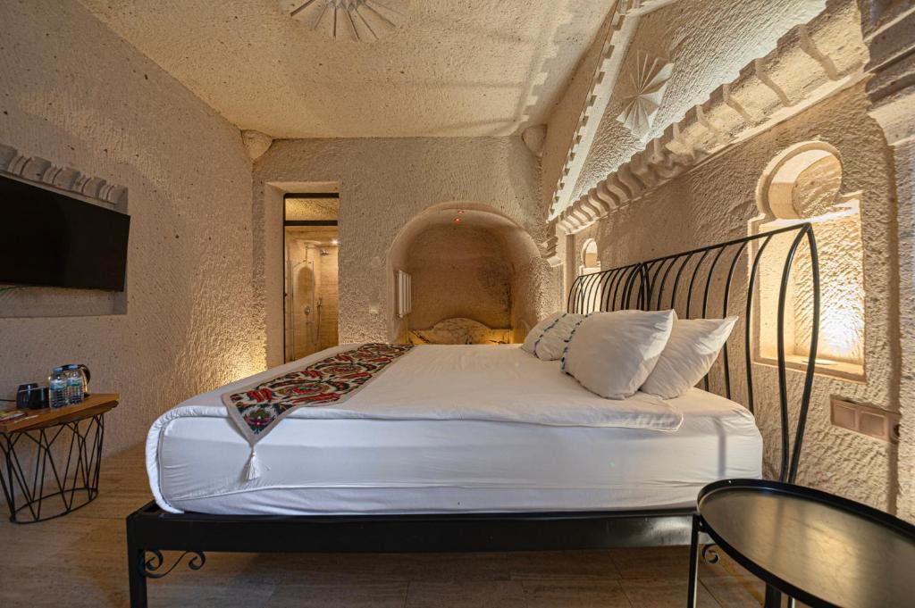 Postel nebo postele na pokoji v ubytování Corner İn Cappadocia