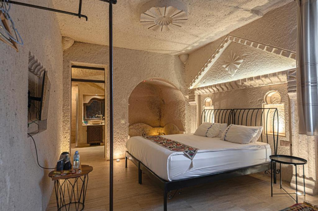 Postel nebo postele na pokoji v ubytování Corner İn Cappadocia