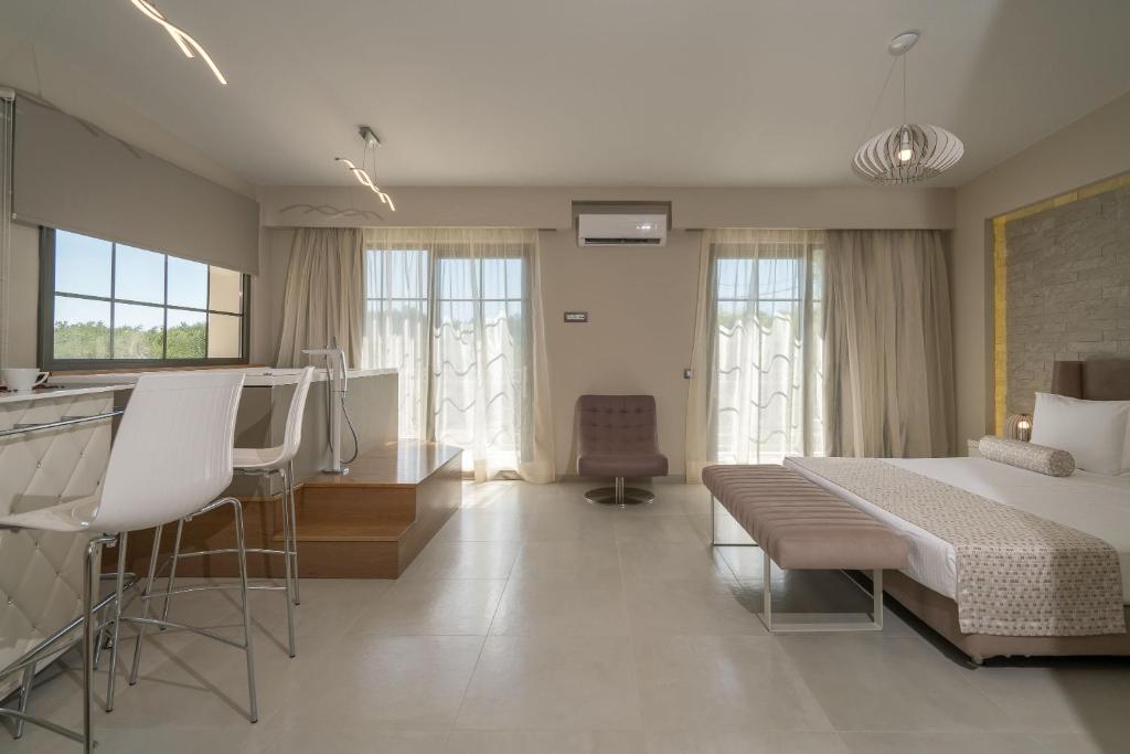 Postel nebo postele na pokoji v ubytování Balcony Boutique Hotel