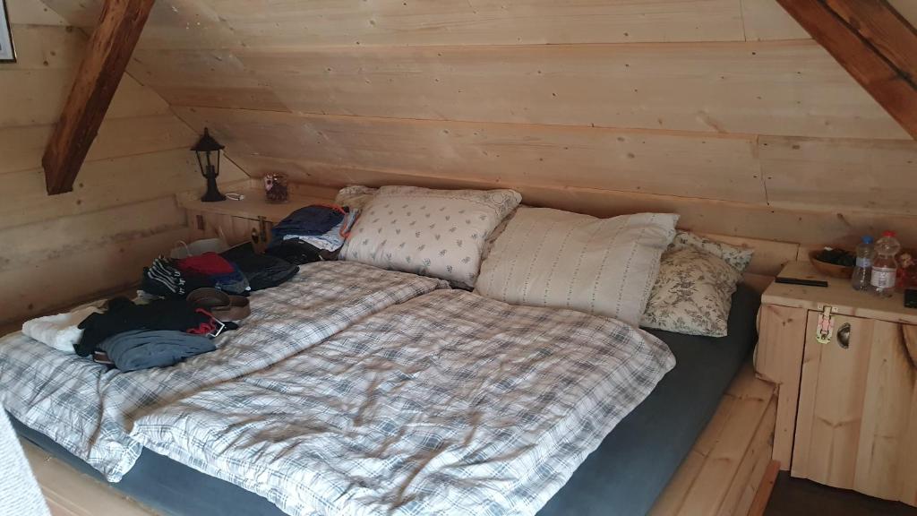 Postel nebo postele na pokoji v ubytování Apartments Beskydy