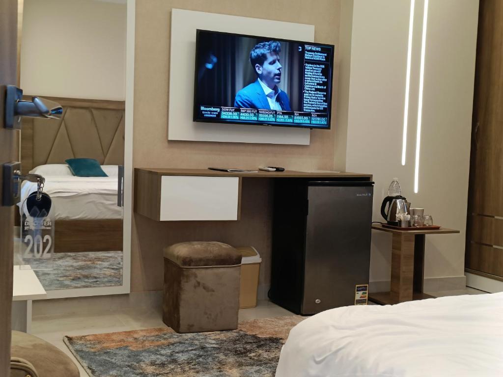 TV a/nebo společenská místnost v ubytování Discover pyramids inn