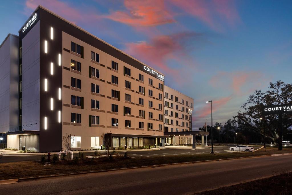 a building on the side of a street at Courtyard by Marriott Pensacola I-10 West in Pensacola