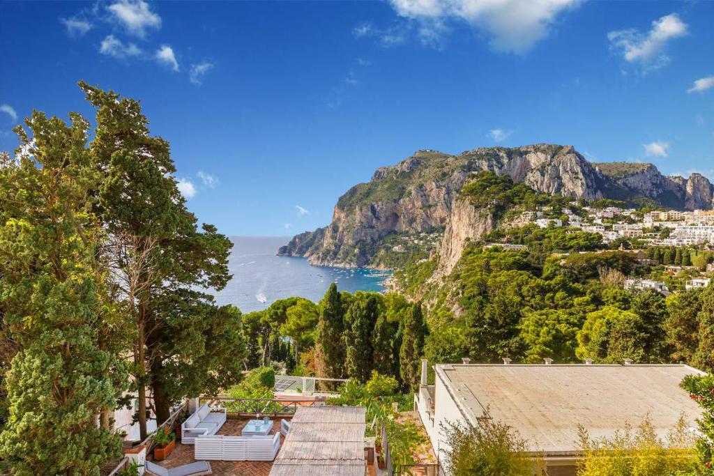 a view of the amalfi coast from positano at Terrazza Tragara in Capri