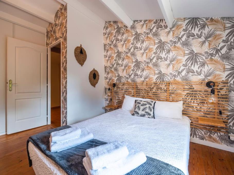 Posteľ alebo postele v izbe v ubytovaní LE GRAND FRANC gite cosy proche tous commerces