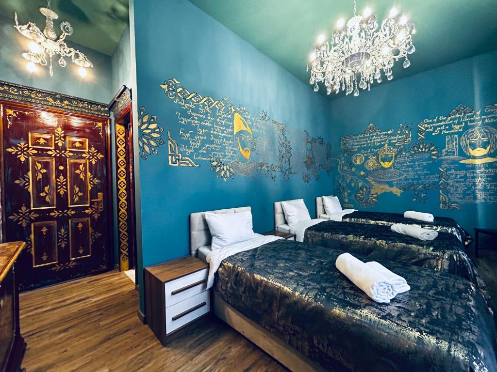 Postel nebo postele na pokoji v ubytování Hotel Zerta Old Tbilisi