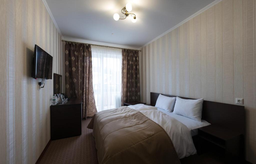 TV a/nebo společenská místnost v ubytování Kasimir Resort Hotel & SPA