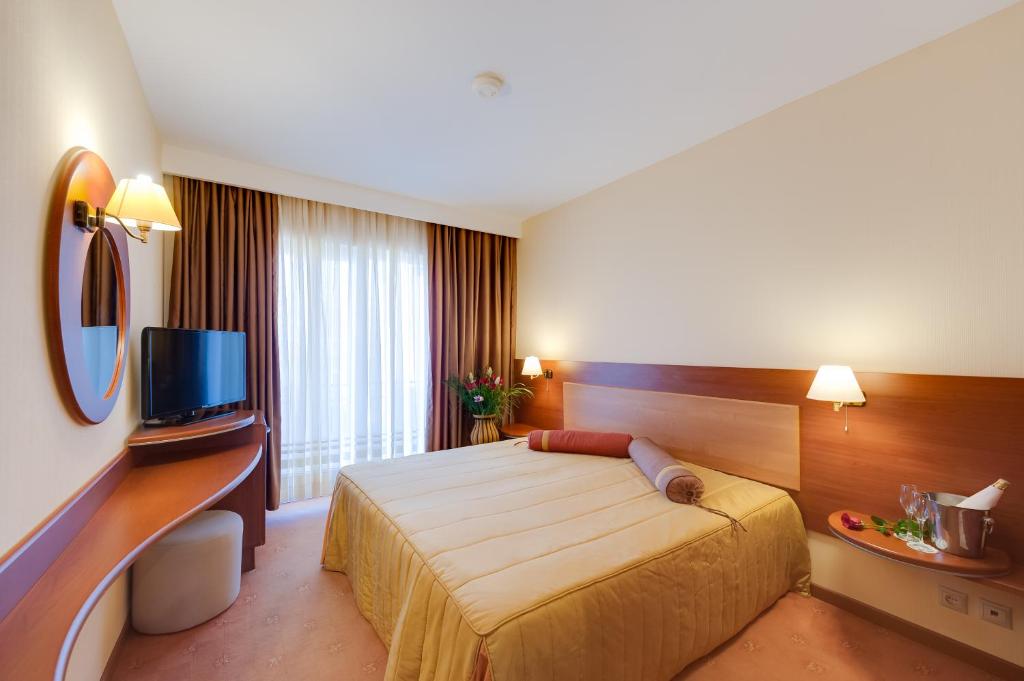 TV a/nebo společenská místnost v ubytování Hotel Palas
