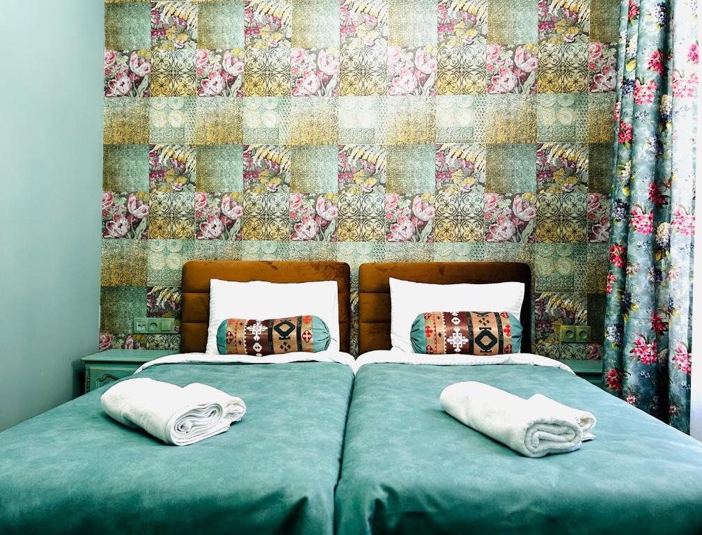 Postel nebo postele na pokoji v ubytování Hotel Zerta Old Tbilisi