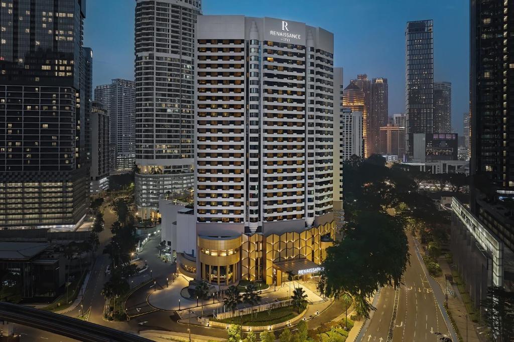 a large building in the middle of a city at Renaissance Kuala Lumpur Hotel & Convention Centre in Kuala Lumpur